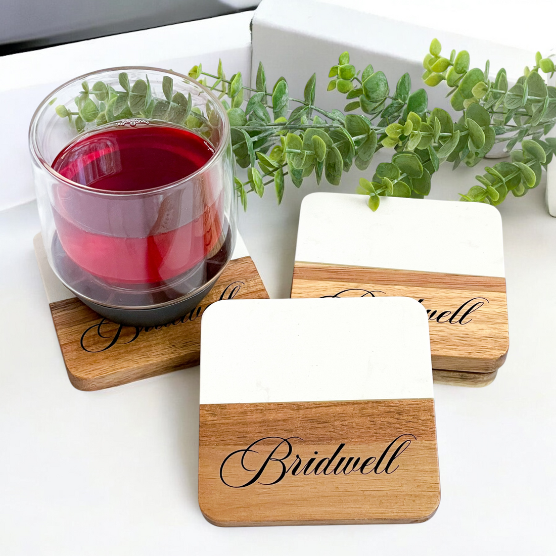 Custom Marble and Acacia Wood Coasters with engraved company logo for branded promotional items, featuring a natural blend of marble and acacia wood, perfect for corporate gifting and professional branding.