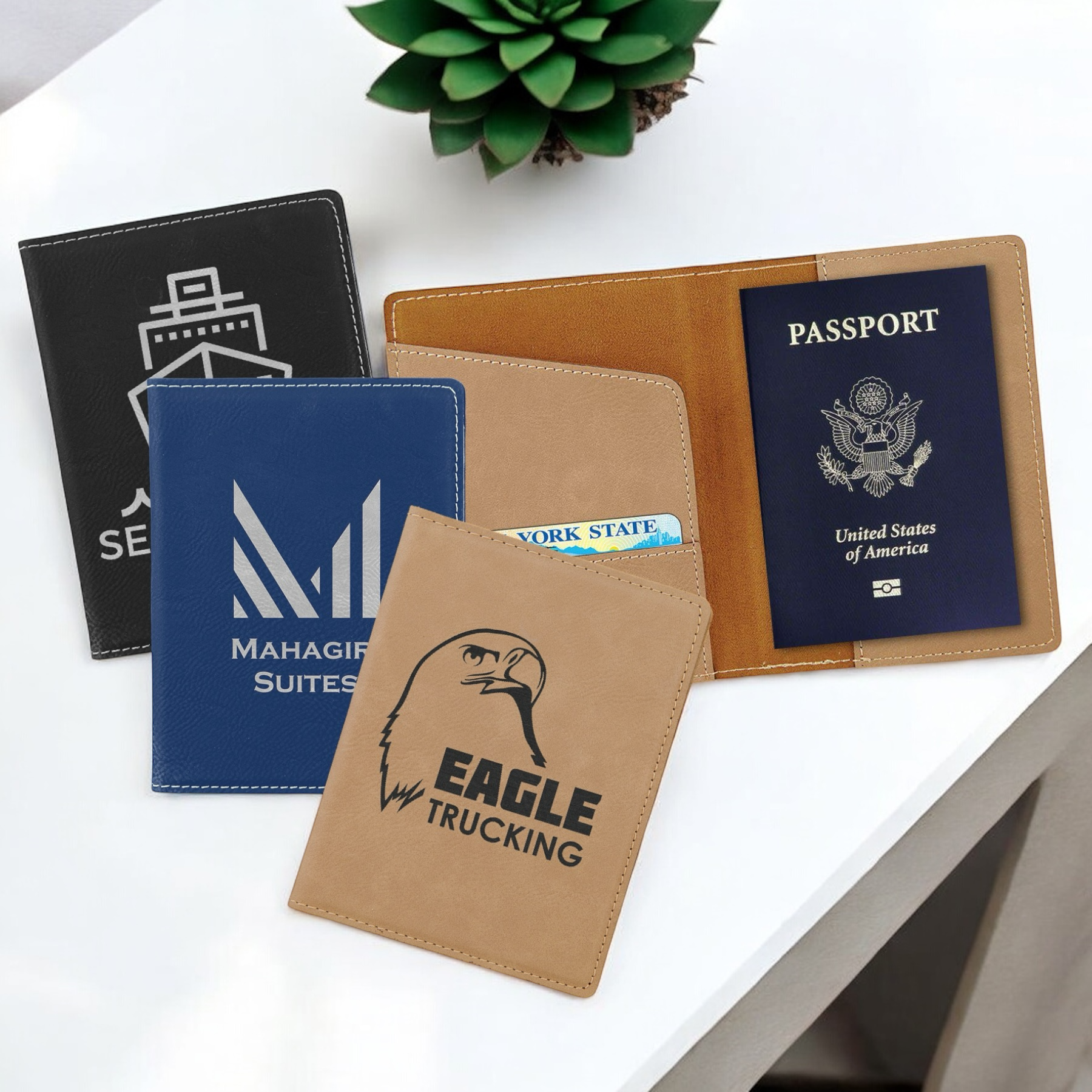 Custom laser-engraved leatherette passport holder with three slots for passport, IDs, and credit cards, perfect for corporate branding and personalized travel gifts.