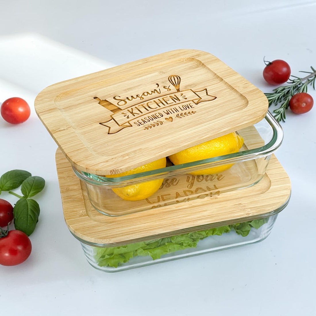 Luxury personalized glass storage container set with engraved bamboo lids featuring custom kitchen design and family-inspired engraving. Eco-friendly reusable meal prep and kitchen organization containers styled with fresh produce for realtor closing gifts, new homeowner gifts, and modern farmhouse kitchen décor.