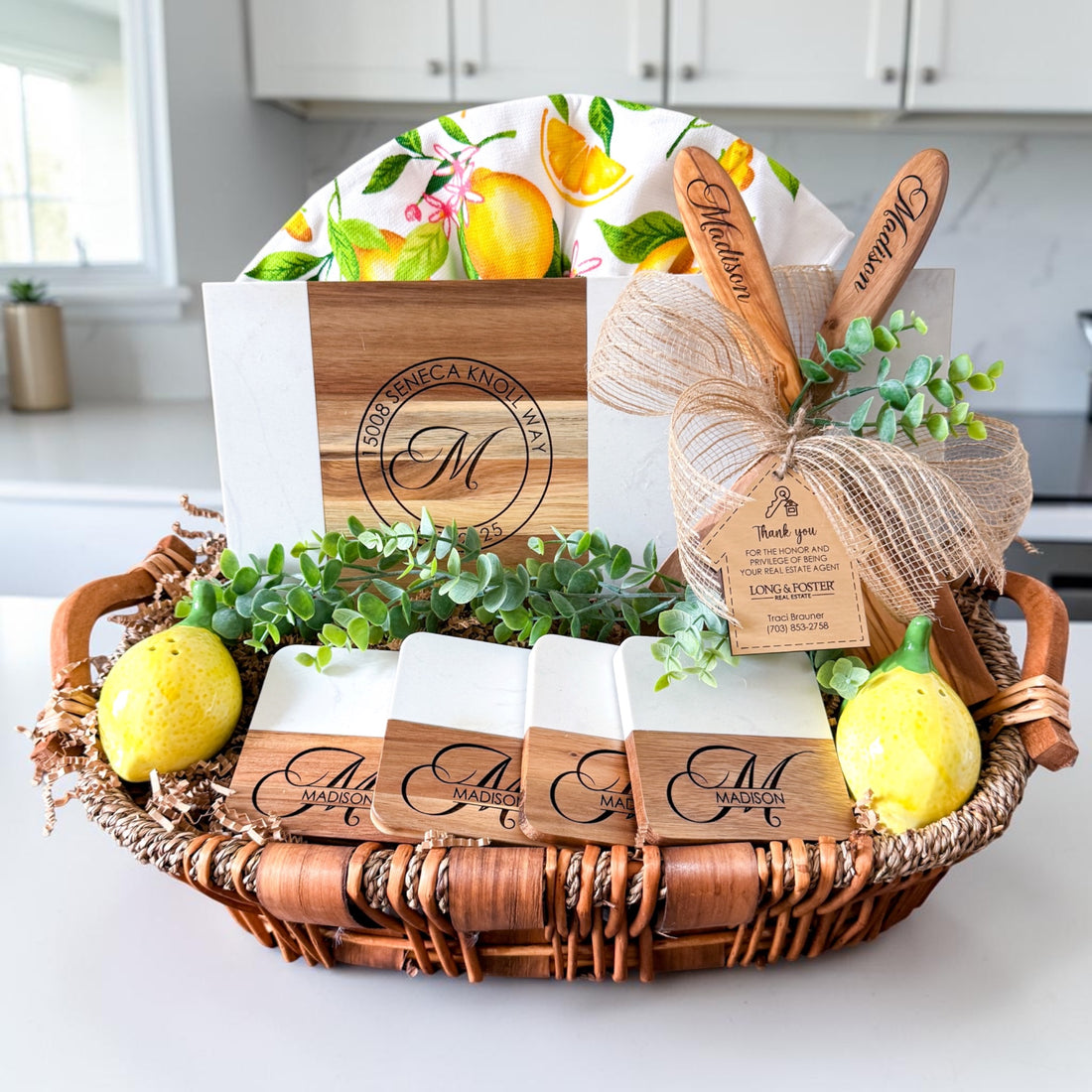 Luxury personalized housewarming and realtor closing gift basket with marble and acacia wood serving board, engraved olive wood utensils and custom coasters
