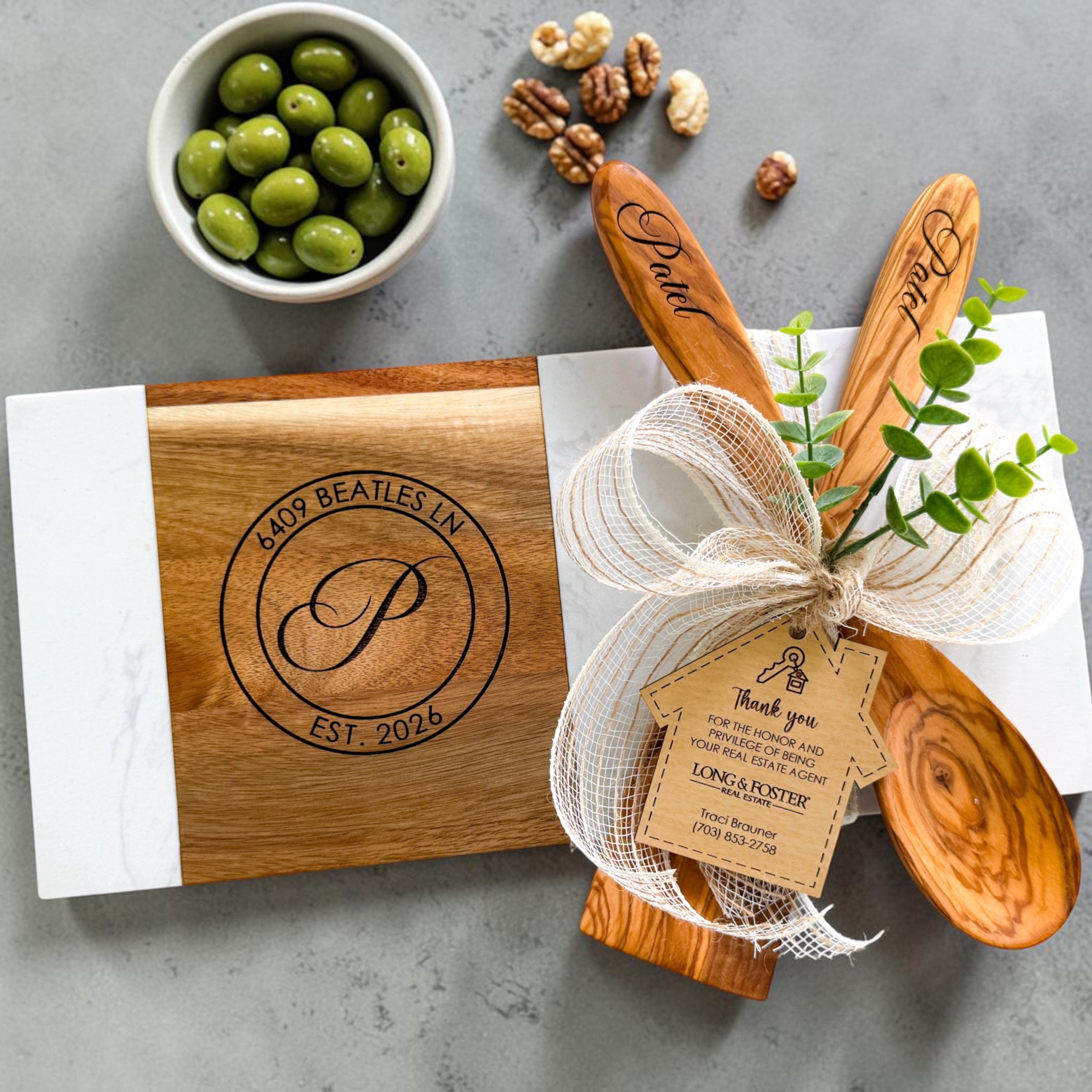 Personalized marble and acacia wood charcuterie board gift set with engraved olive wood serving utensils and realtor thank you gift tag for luxury client appreciation gifting